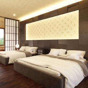 旅館の客室の壁面装飾に「切子風ガラス」を使用した事例