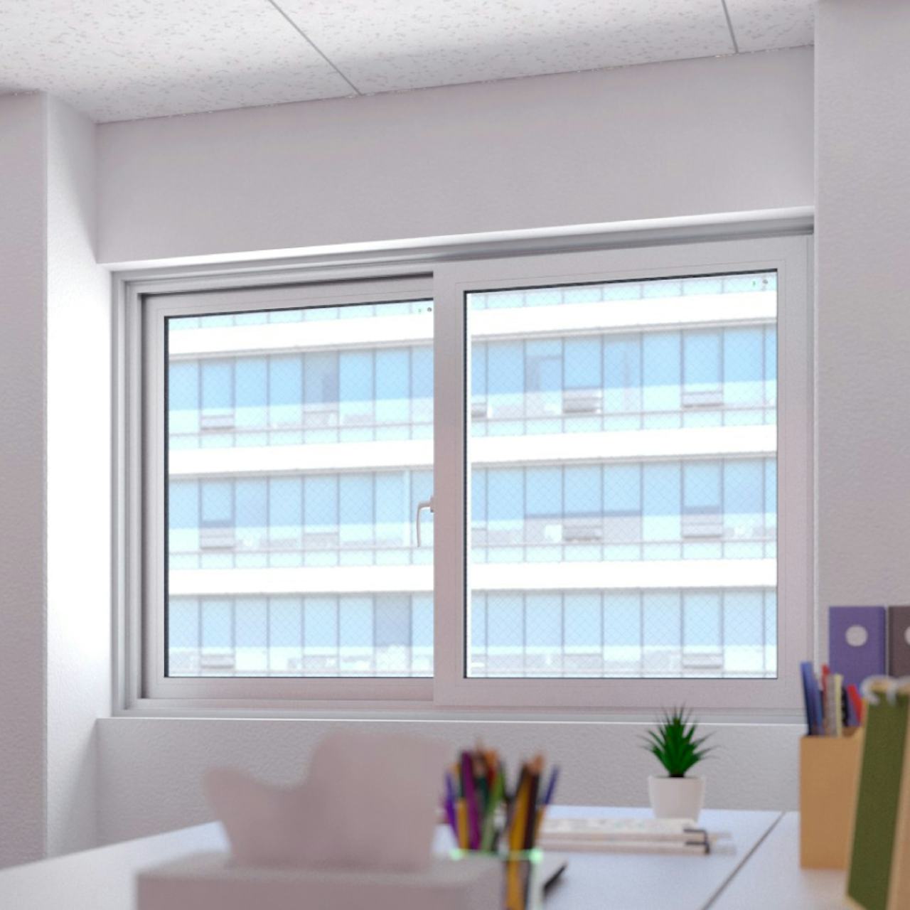 地震や台風に強い窓ガラス「網入りガラス」を、ビルの窓に使用した事例